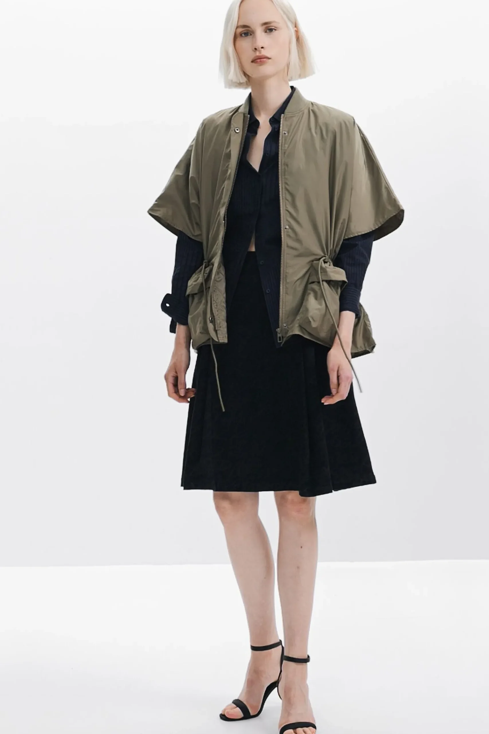 Adjustable nylon poncho
