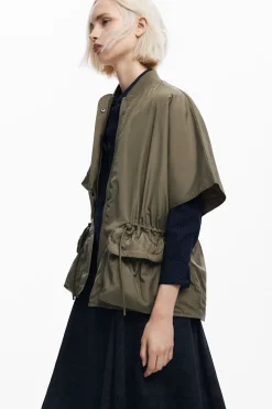 Adjustable nylon poncho