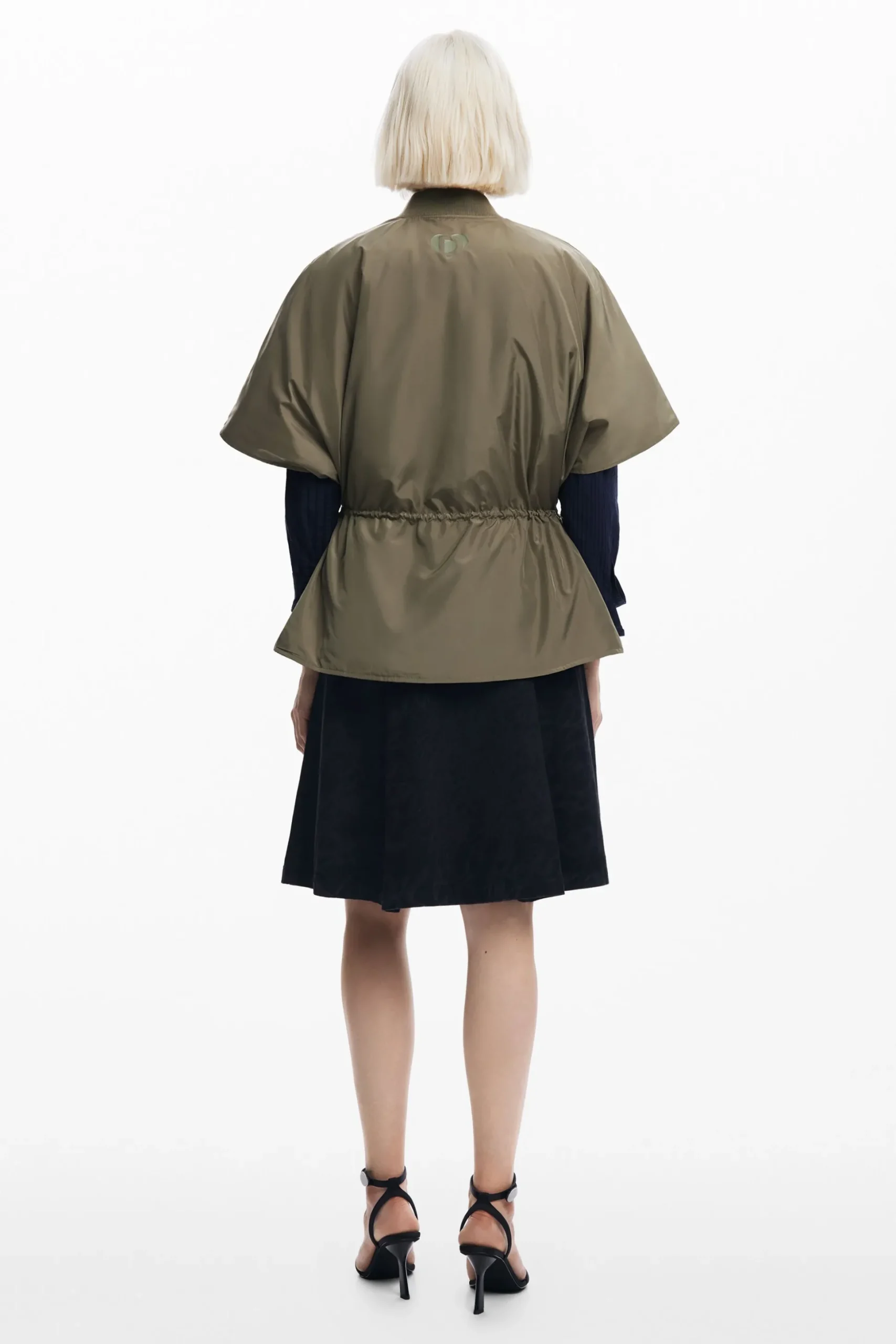 Adjustable nylon poncho