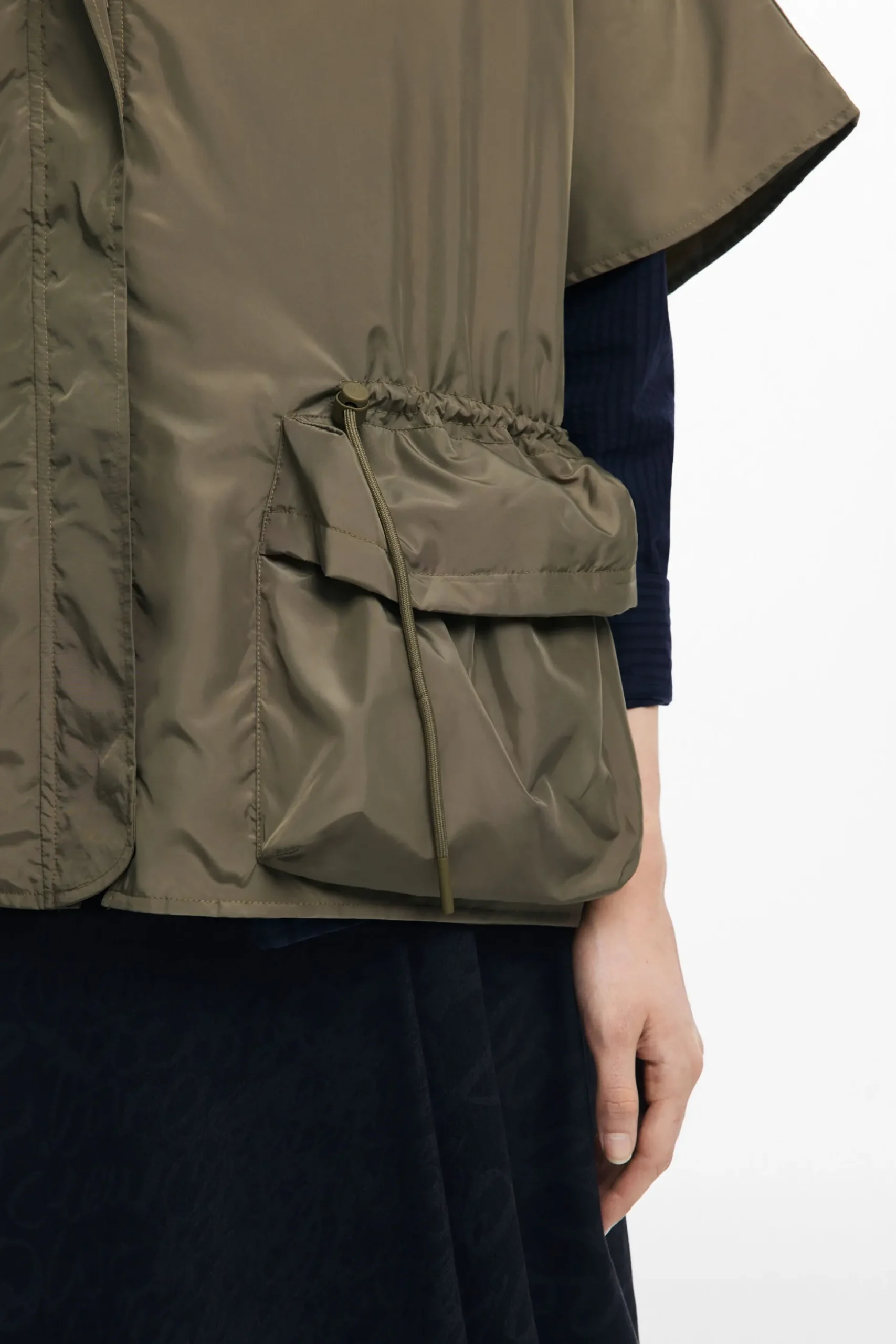 Adjustable nylon poncho
