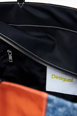 Arty patch bag with large handles