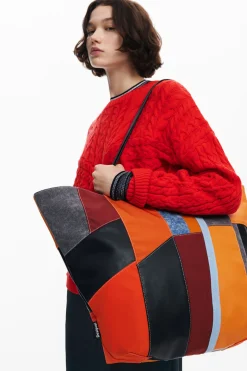 Arty patch bag with large handles