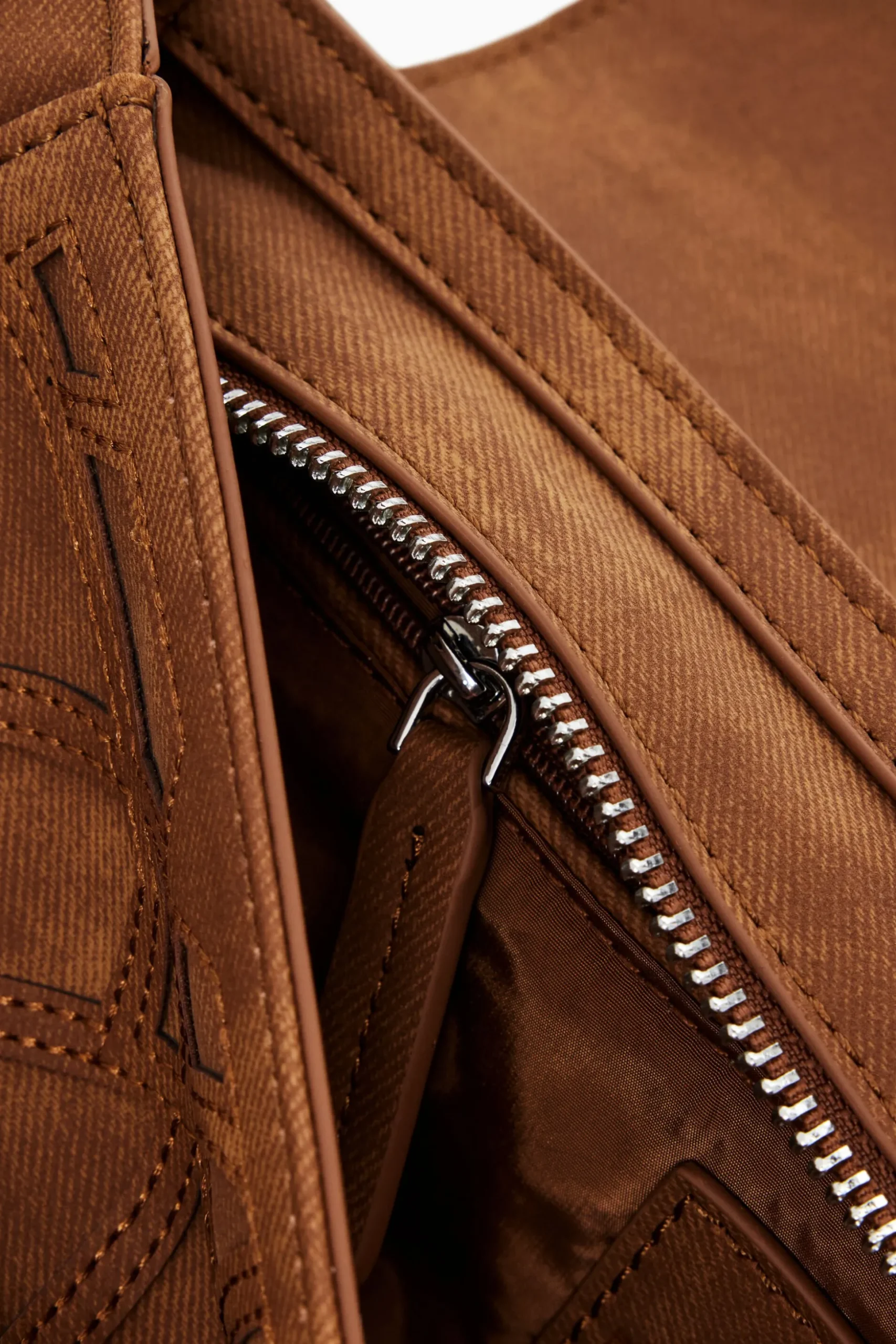 Bag with geometric embossing