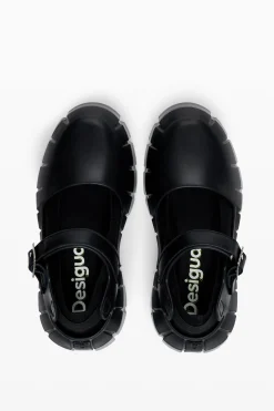 Ballet flat with side release closure