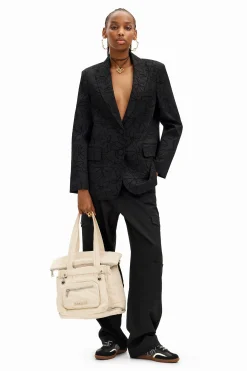 Blazer with die-cut flower silhouette