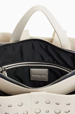 Circle pattern faux leather backpack