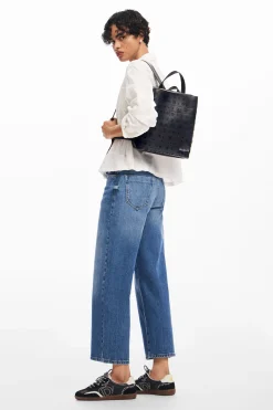 Circle pattern faux leather backpack