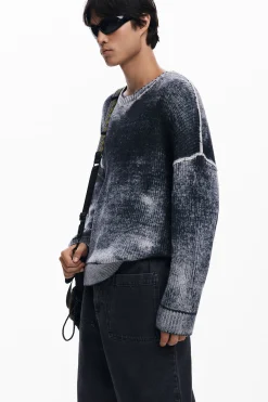 Distressed knit sweater