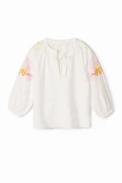 Flowy blouse with watercolor floral print.
