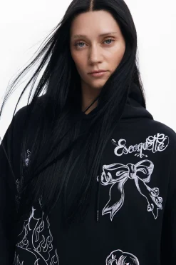 María Escoté hooded dress