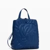 Mini backpack with geometric flowers