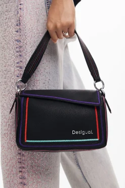 Multilineal handbag with zipper
