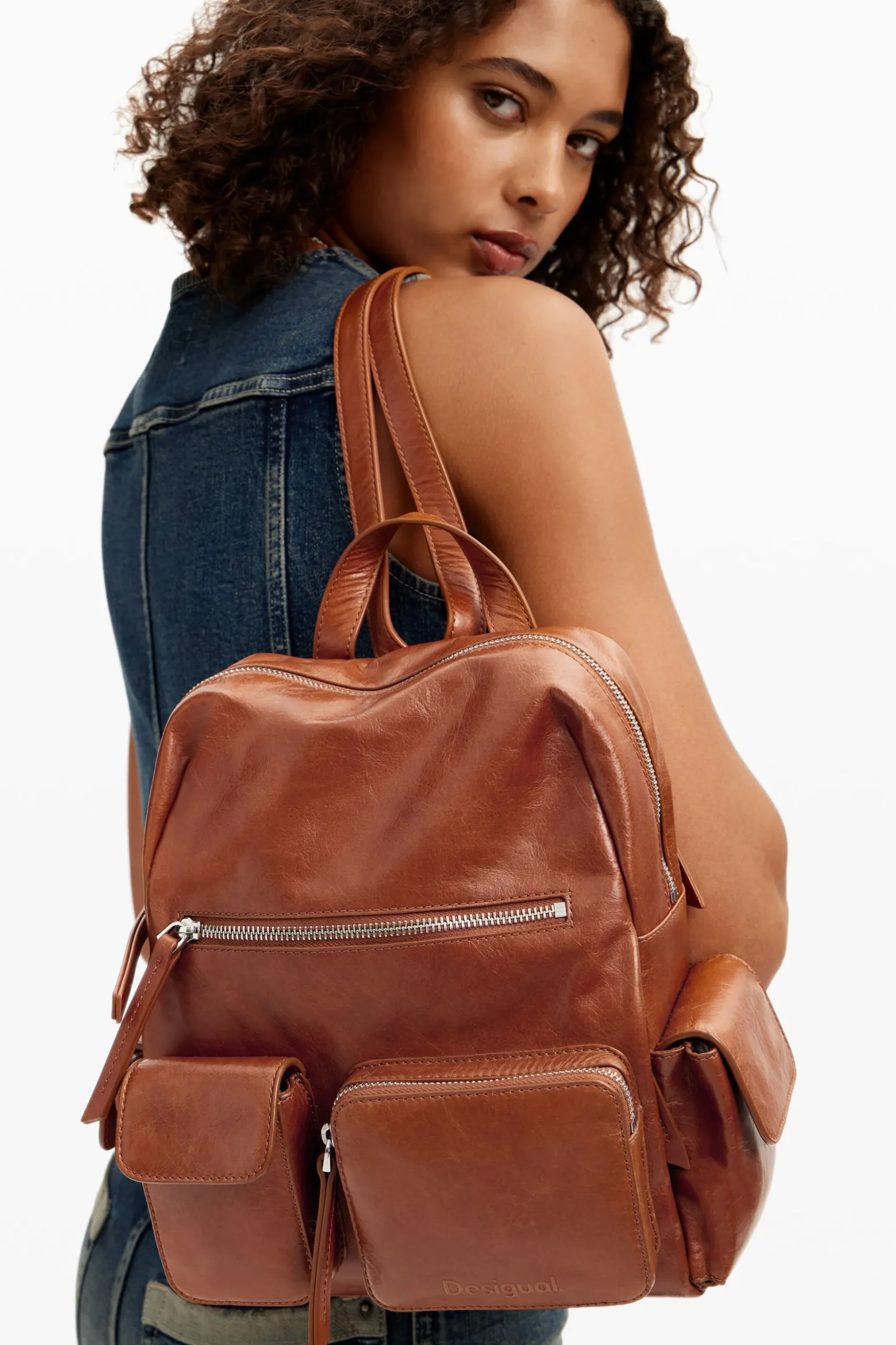 Multi-pocket leather backpack