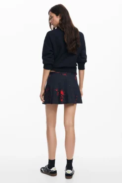 Pleated miniskirt by M. Christian Lacroi