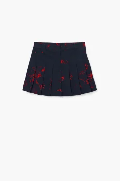 Pleated miniskirt by M. Christian Lacroi