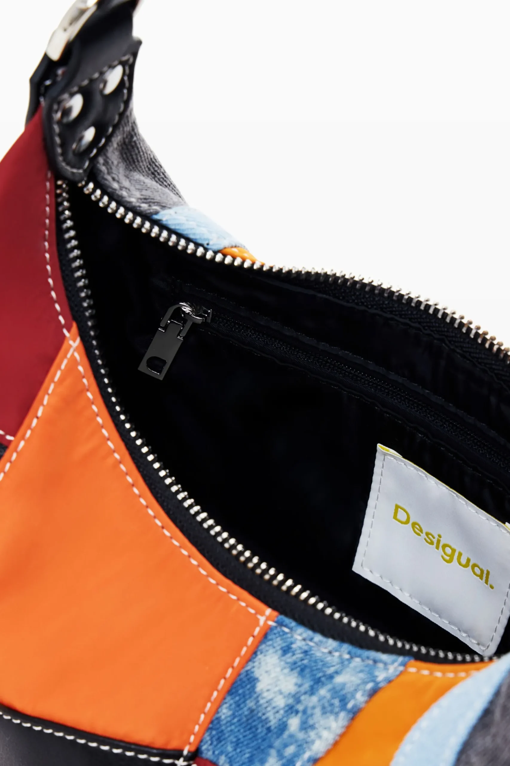 Textured patch shoulder bag